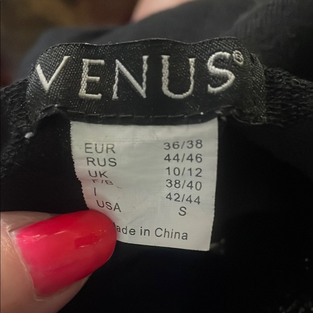 Tommy dress long sleeve zips up and down both ends .